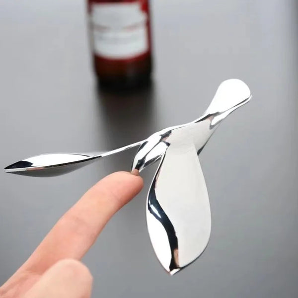 Balancerende Vogelflesopener