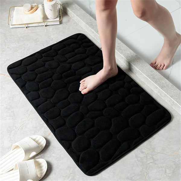 Antislip badmat met reliëfpatroon van kasseien