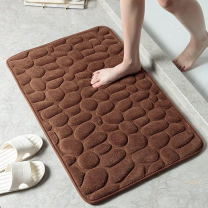 Antislip badmat met reliëfpatroon van kasseien