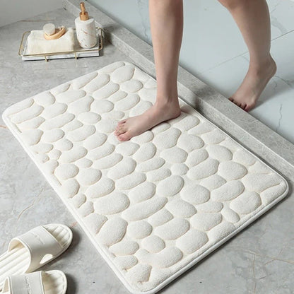 Antislip badmat met reliëfpatroon van kasseien