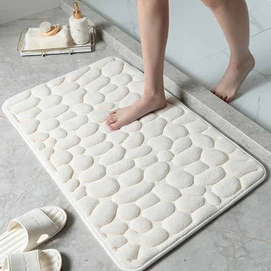 Antislip badmat met reliëfpatroon van kasseien