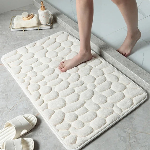 Antislip badmat met reliëfpatroon van kasseien 
