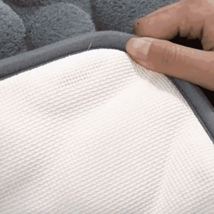 Antislip badmat met reliëfpatroon van kasseien