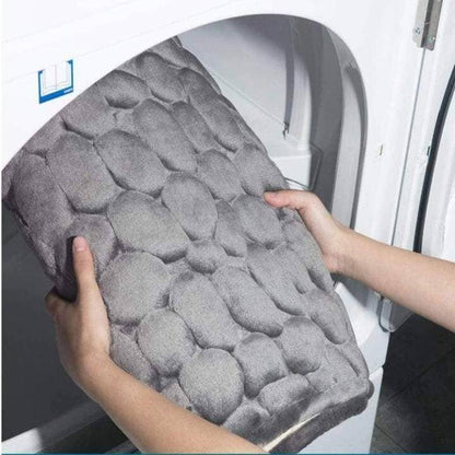 Antislip badmat met reliëfpatroon van kasseien