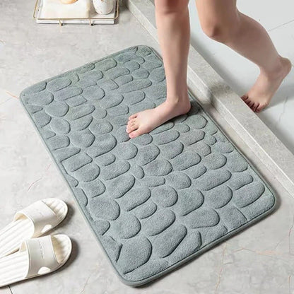 Antislip badmat met reliëfpatroon van kasseien