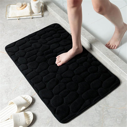 Antislip badmat met reliëfpatroon van kasseien