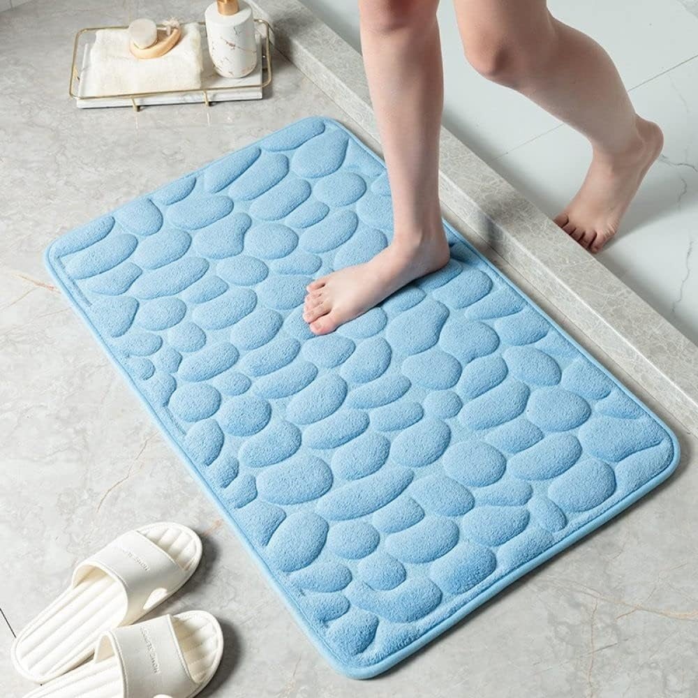 Antislip badmat met reliëfpatroon van kasseien
